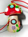 Amanita mushroom pendant / necklace with secret hiding spot / festival fairy container vial side