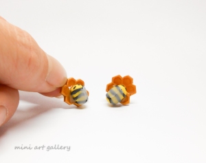 Bumble bee on honeycomb post stud earrings / cute honeybee spring kawaii handmade polymer clay jewelry / resin coating